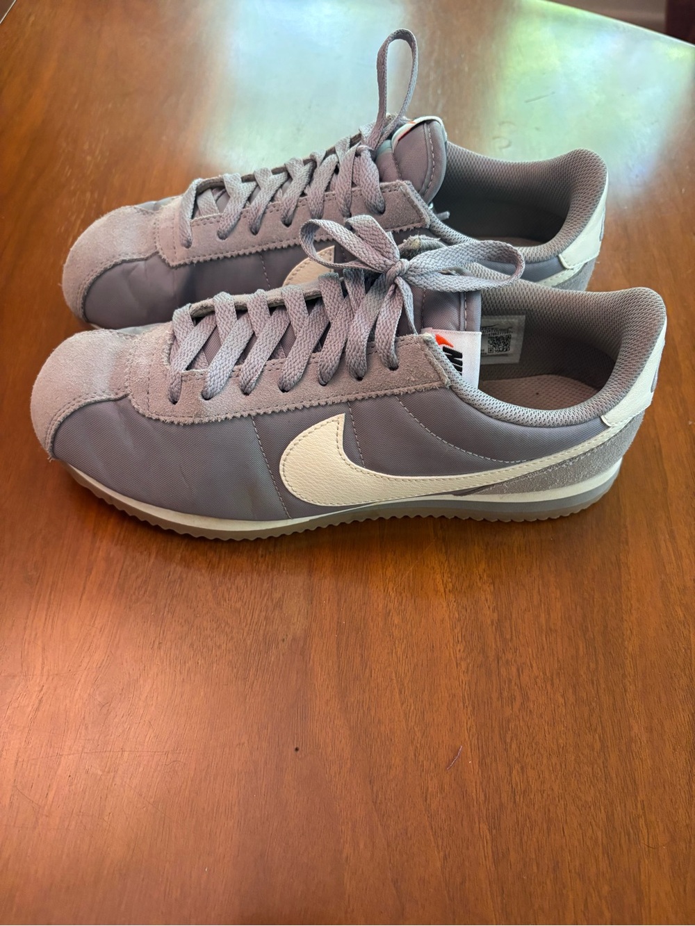 Nike Unisex Cortez Textile Sneakers - Light Gray with White Swoosh. W 8.5. M 7.